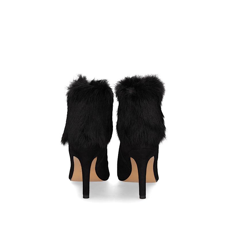 Bottines doublées en cuir, extérieur en suède noir et fourrure.