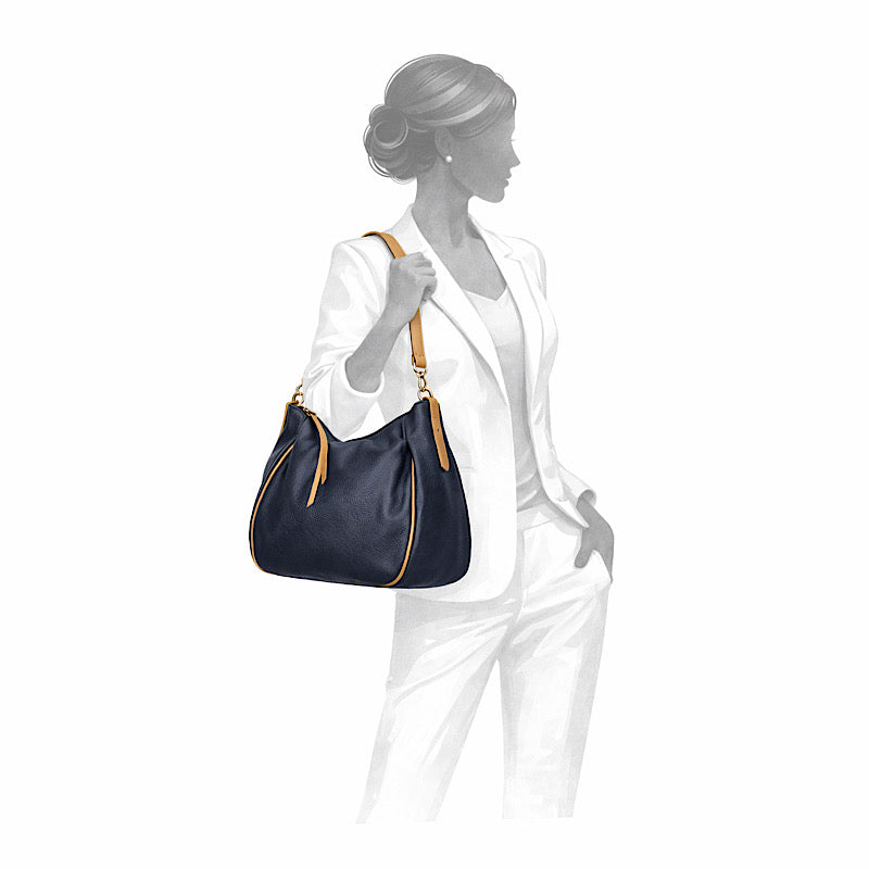 Sac marine et cognac en cuir souple.