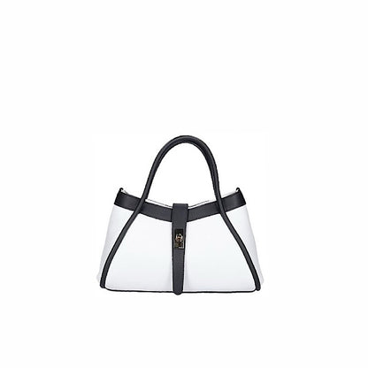 Sac à main noir et blanc en cuir souple.